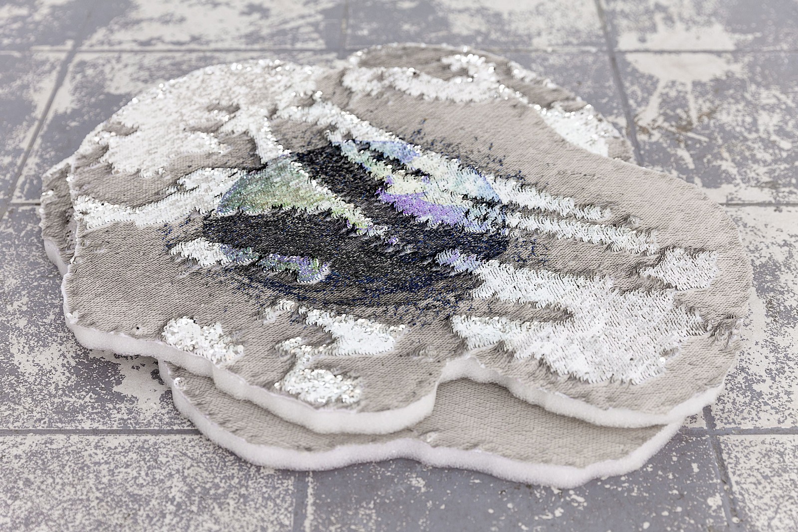 Image - Orbital Debris printed on textile (moving sequins), 46 × 65 × 2.5 cm