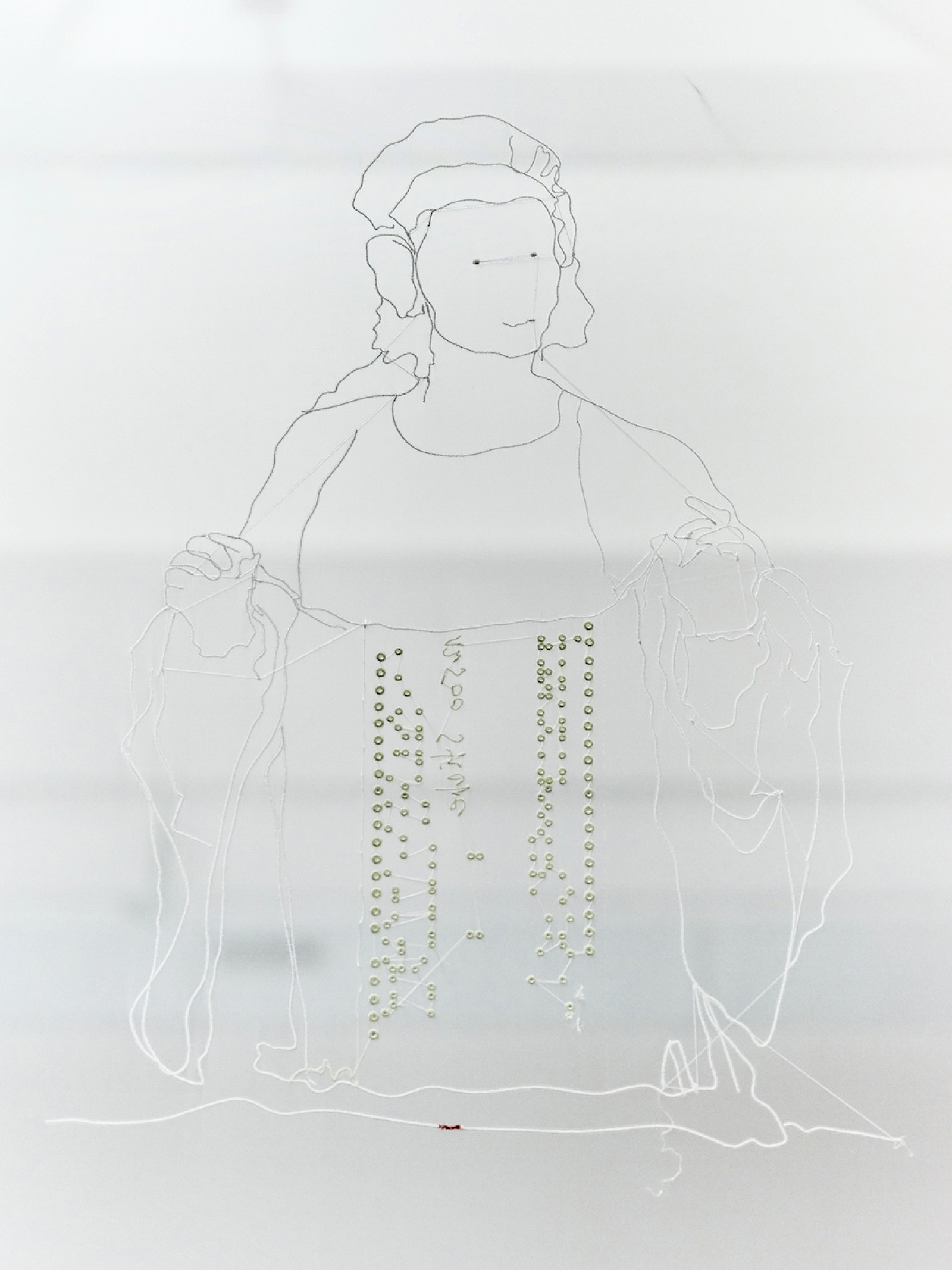 Image - Embroidery, Clotho holding a punched card with 12’500 stitches