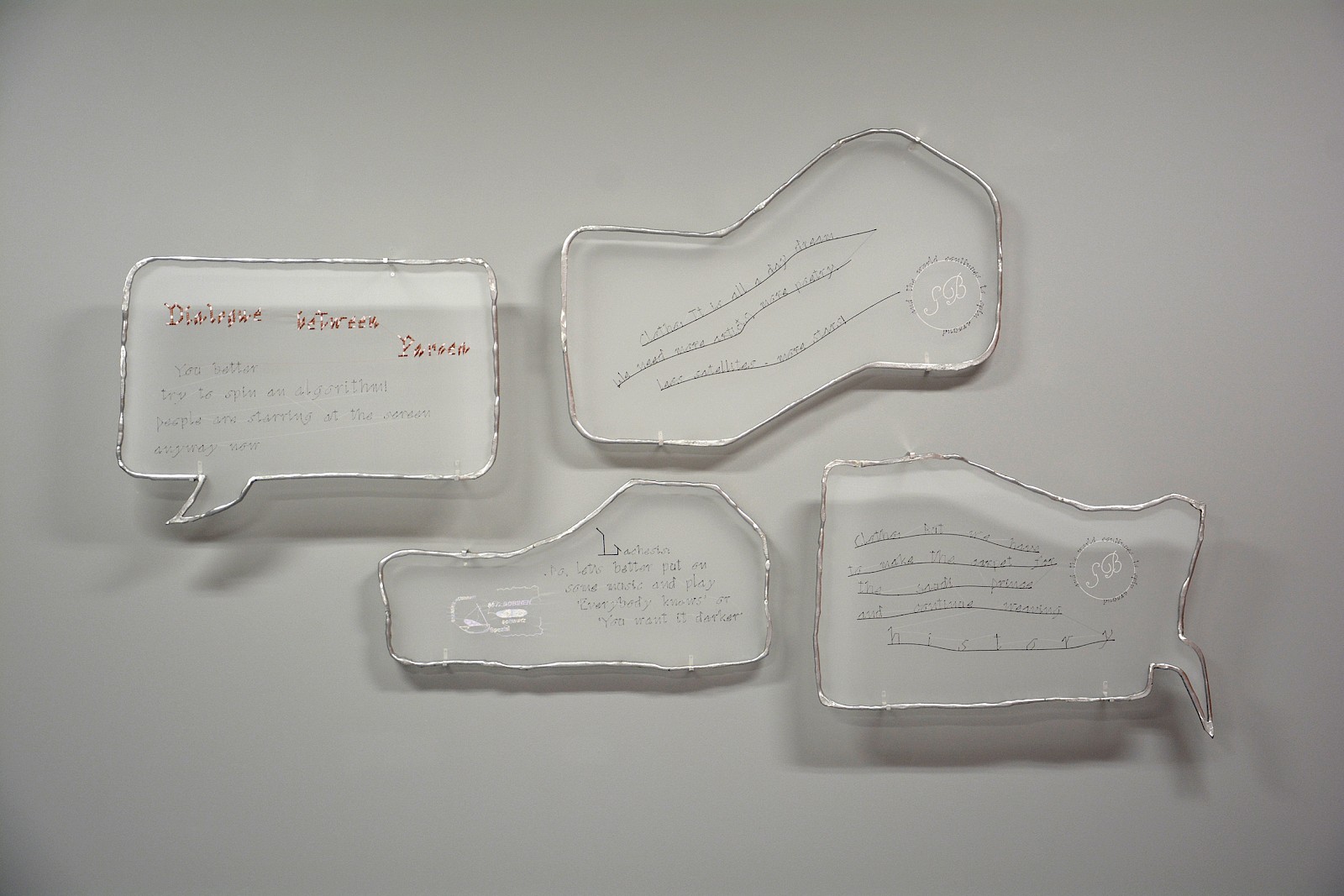 Image - Speechbubbles: Alumnium frames with embroidered text